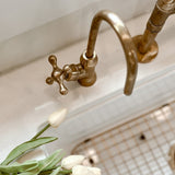 unlacquered brass cold water faucet