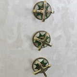 green decorated shower system handles