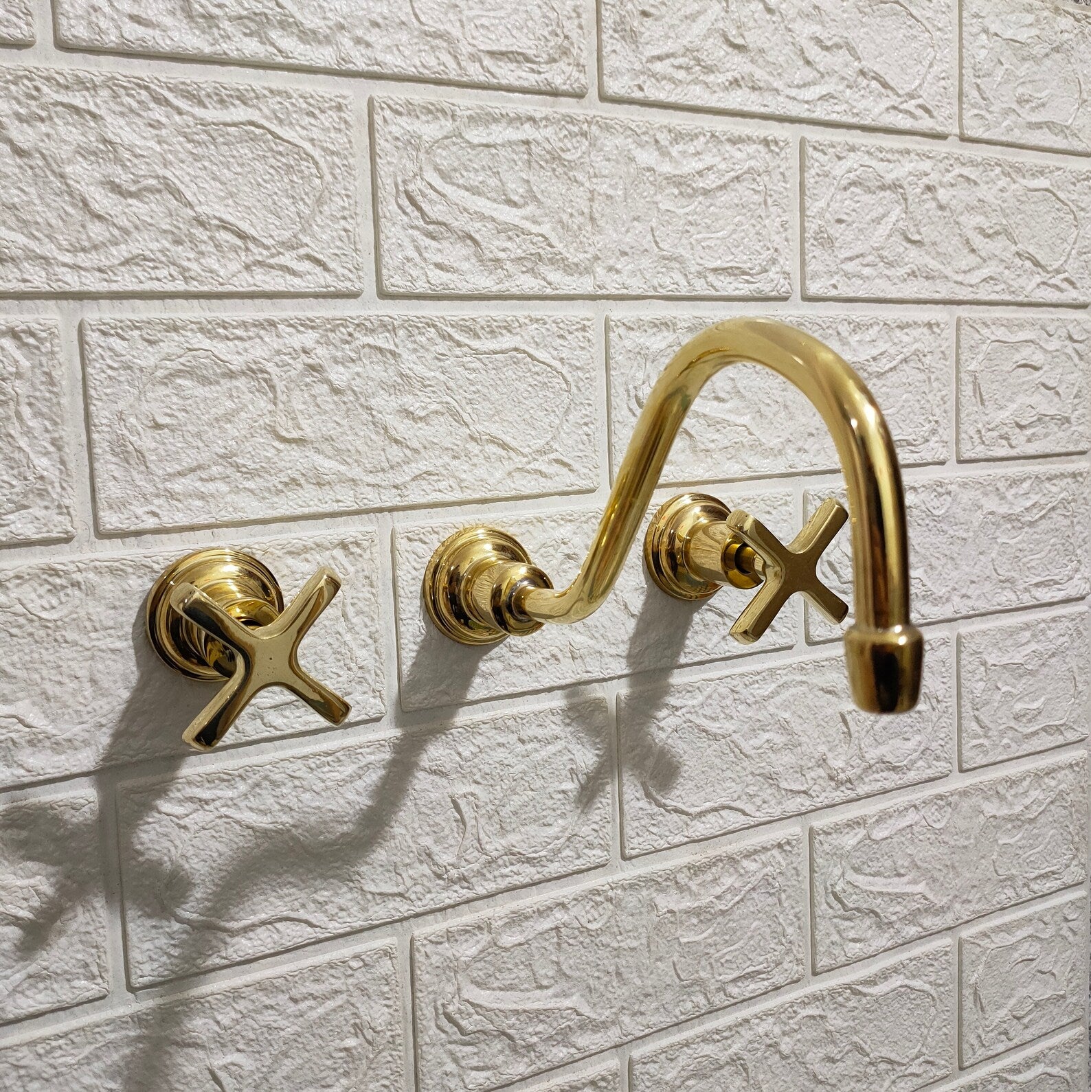 Unlacquered Brass Wall Mount Faucet With Curved Spout