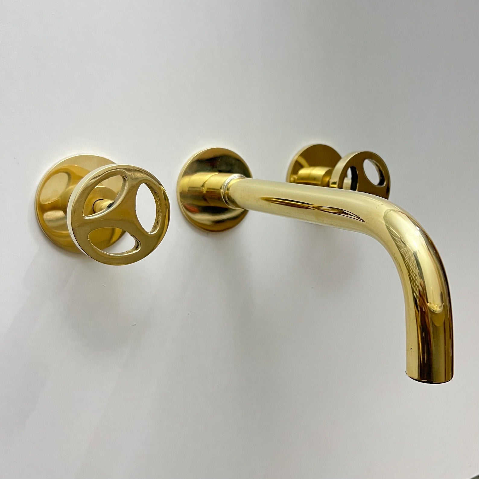 Unlacquered Brass Wall Mounted Faucet With Wheel Handles