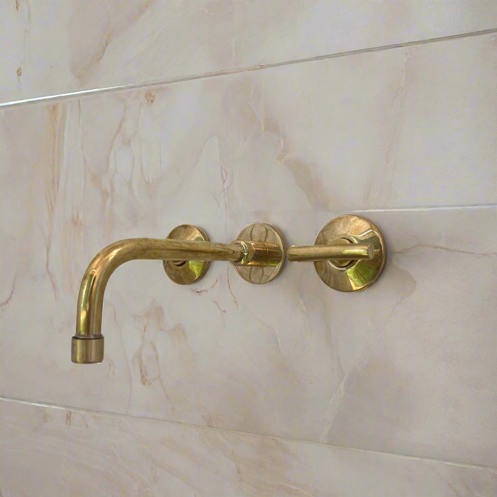unlacquered brass bathroom faucet