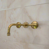 unlacquered brass bathroom faucet