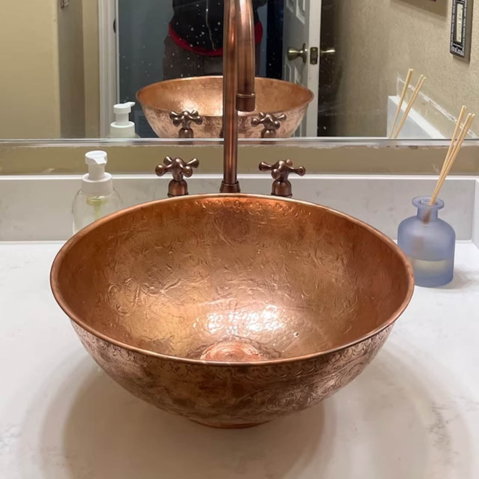 Engraved copper bathroom sink
