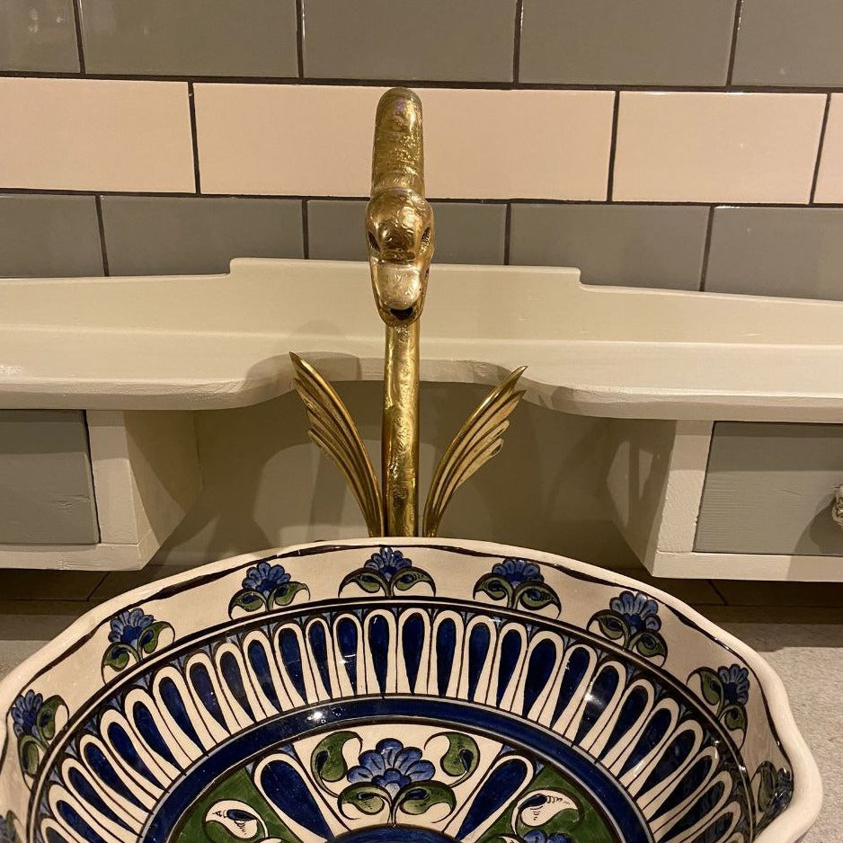 single hole bathroom faucet with wings and swan head