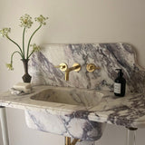 unacquered brass wall mounted faucet