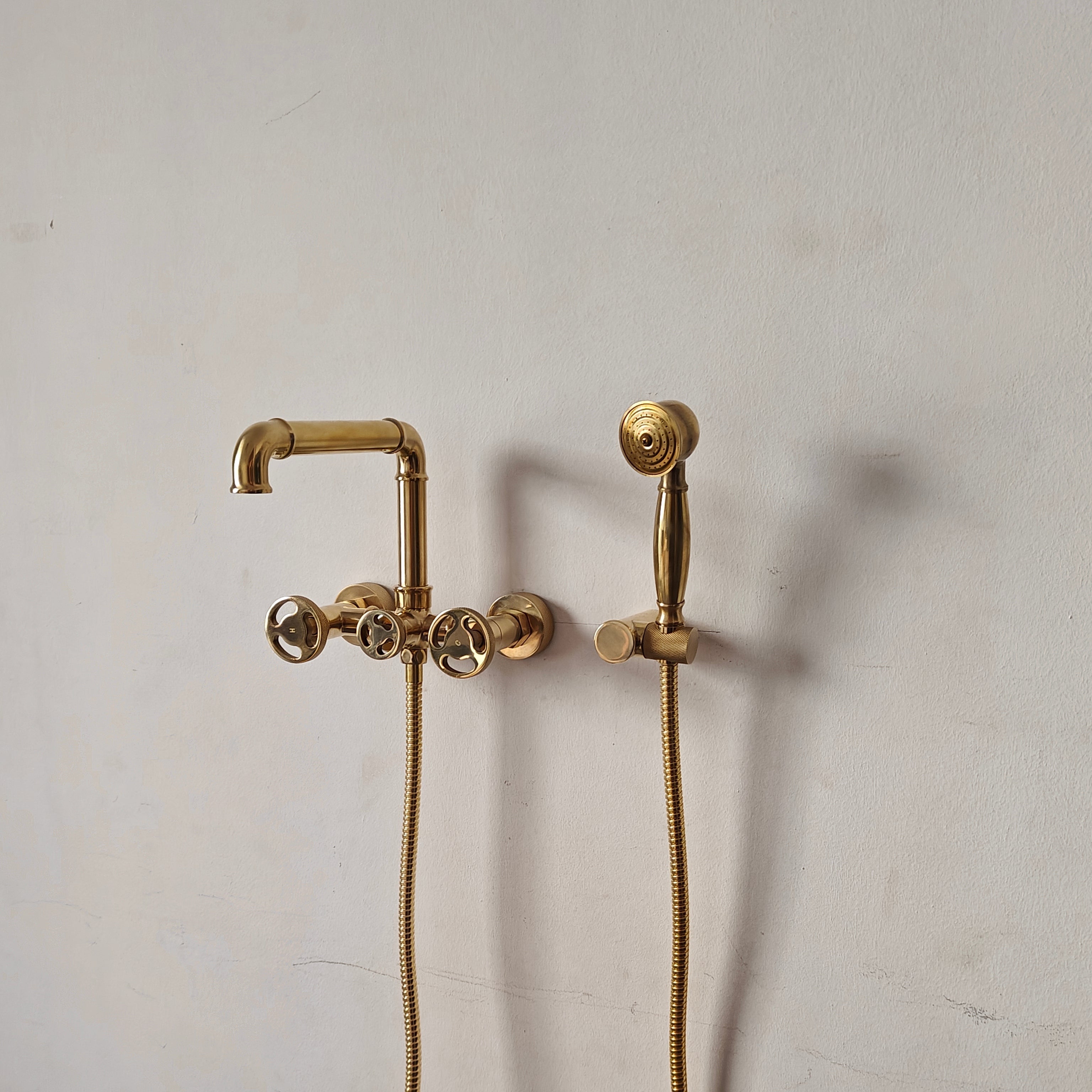 brass wall mount tub faucet with handles