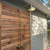 unlacquered brass shower system with hendshower