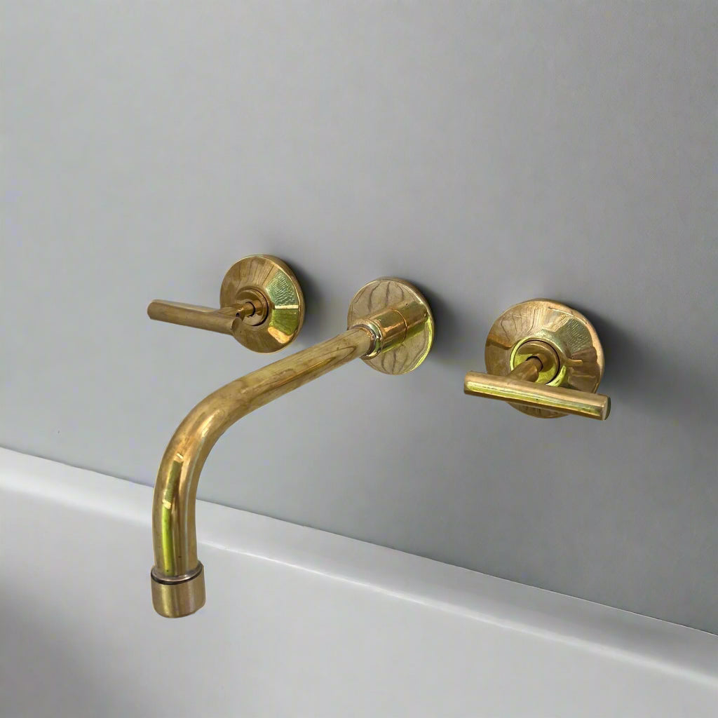 unlacquered brass bathroom faucet