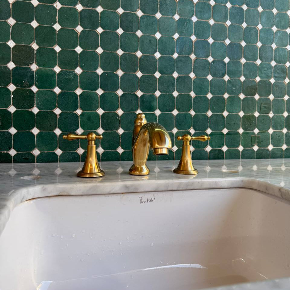 unlacquered brass bathroom faucet with lever handle