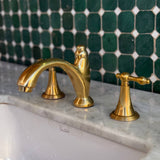unlacquered brass bathroom faucet with vintage style