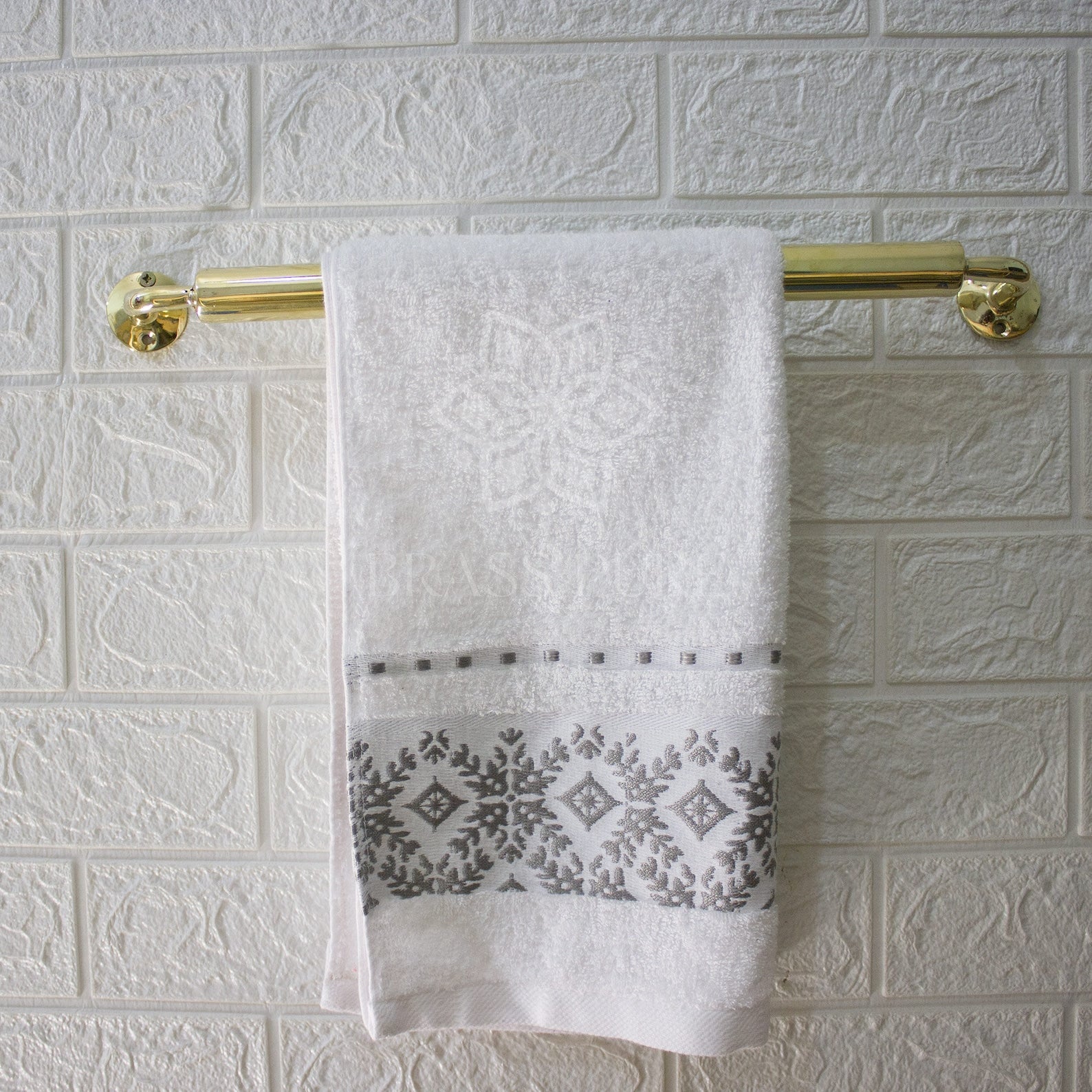 unlacquered brass bathroom towel holder
