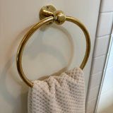 unlacquered brass circle towel holder