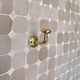 unlacquered brass hooks for clothes and towels