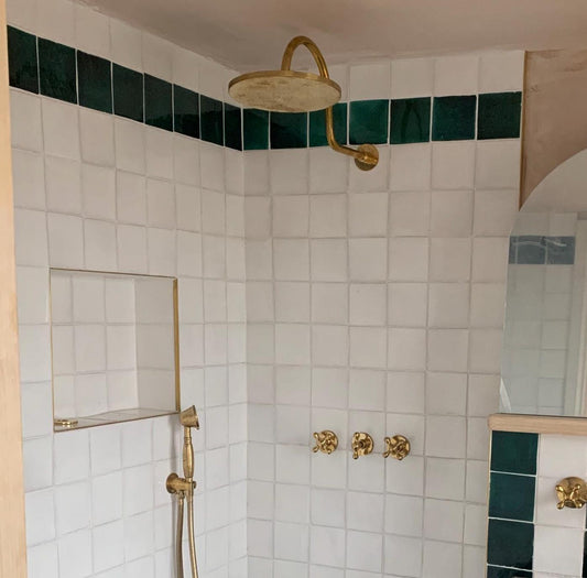 unlacquered brass shower system with handheld