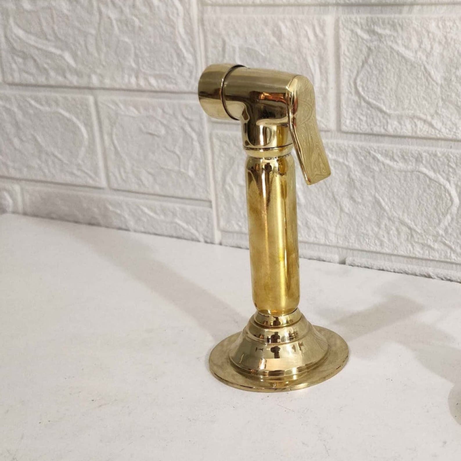 Unlacquered brass kitchen side sprayer