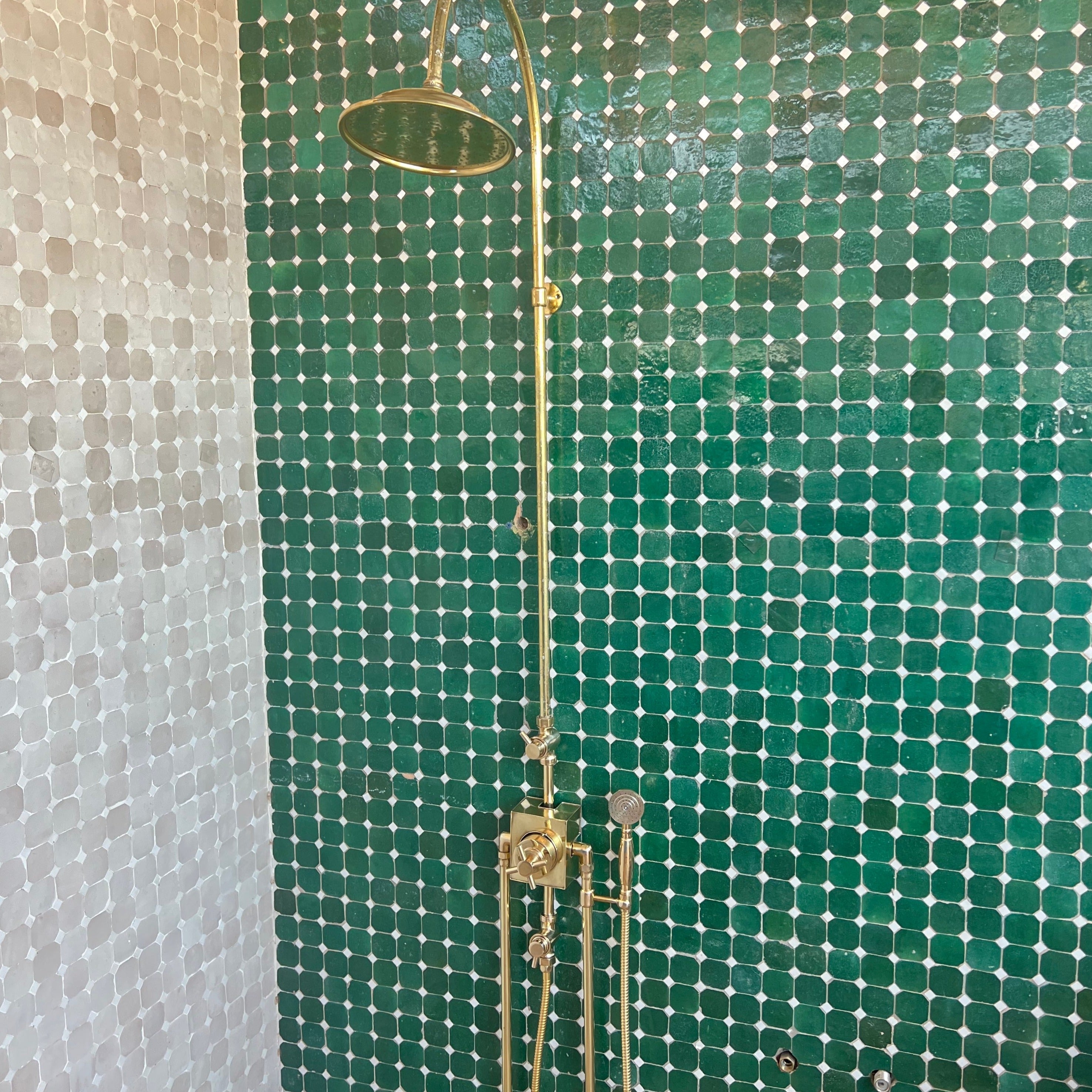 unlacquered brass thermostatic shower system with handheld