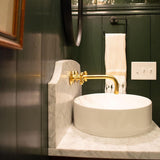 unlacquered brass wall mount faucet with custom handle
