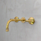 unlacquered brass wall mounted faucet