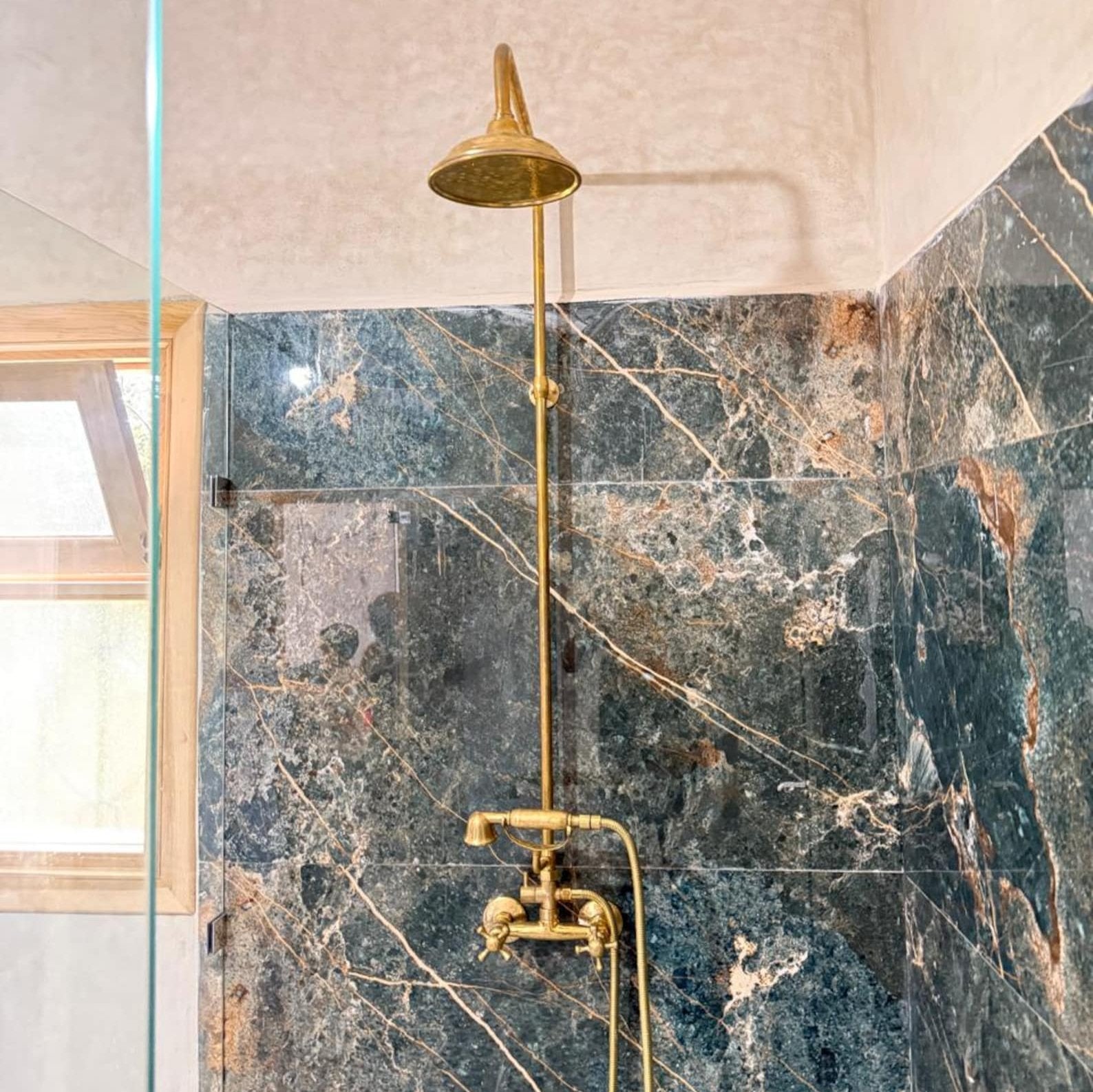 unlacquered brass shower system