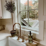unlacquered brass bridge kitchen faucet
