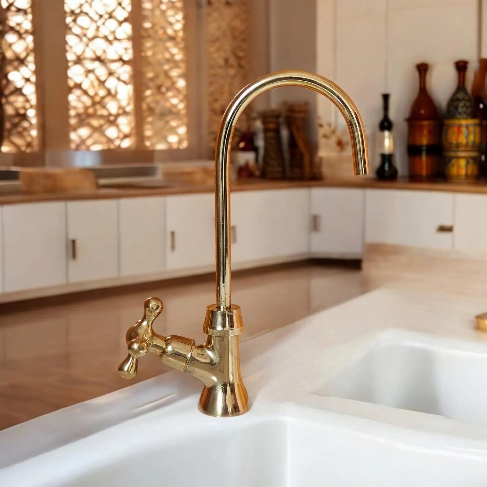 unlacquered brass cold water kitchen faucet