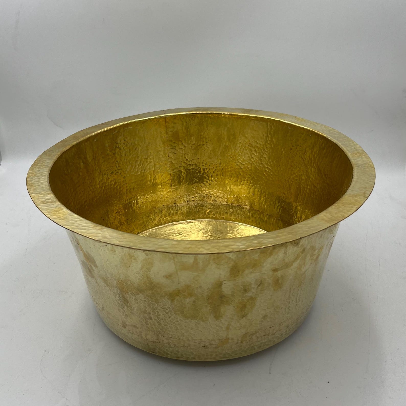 unlacquered solid brass round sink