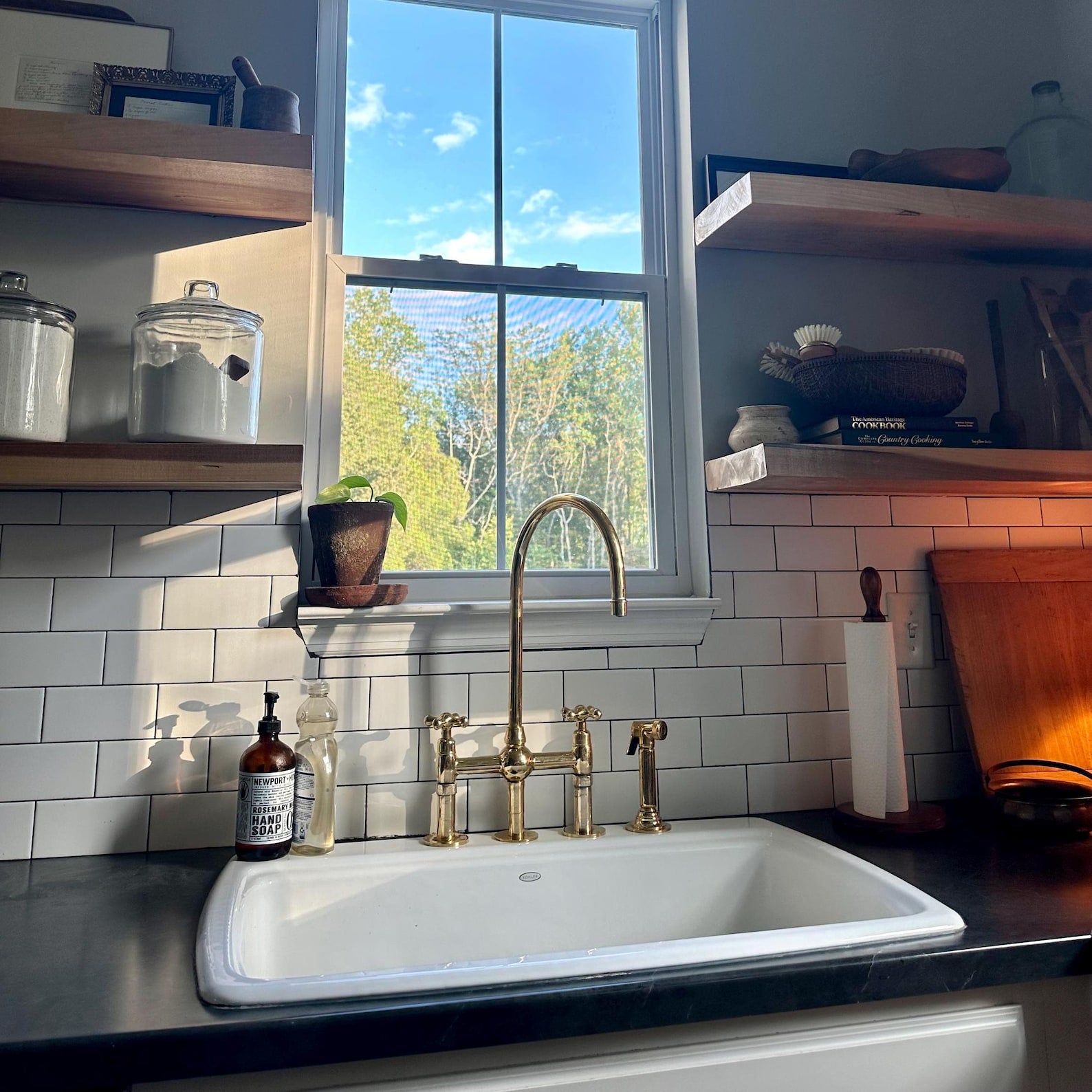 unlacquered brass kitchen faucet with sprayer 