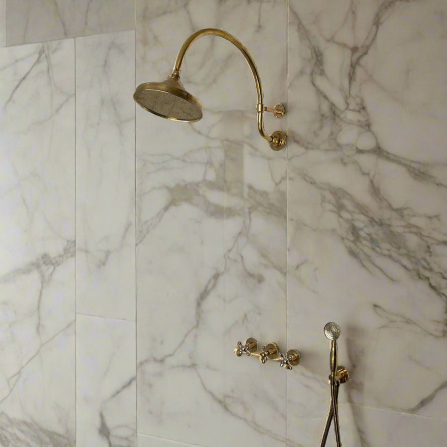 unlacquered brass shower system with handshower