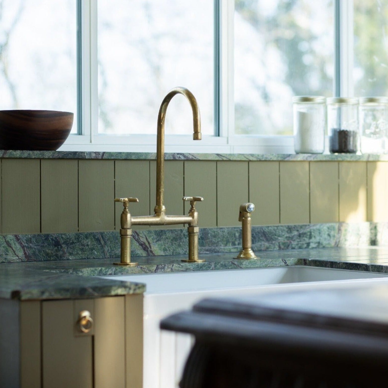 unlacqured brass bridge faucet for kitchen